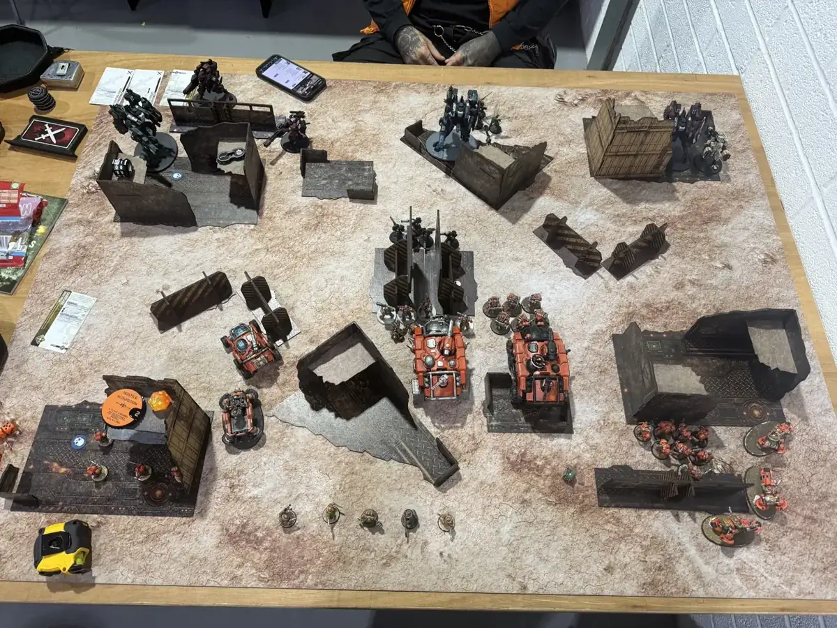 Overhead photograph after the first advance, showing Hekatons and Steeljacks around the central terrain