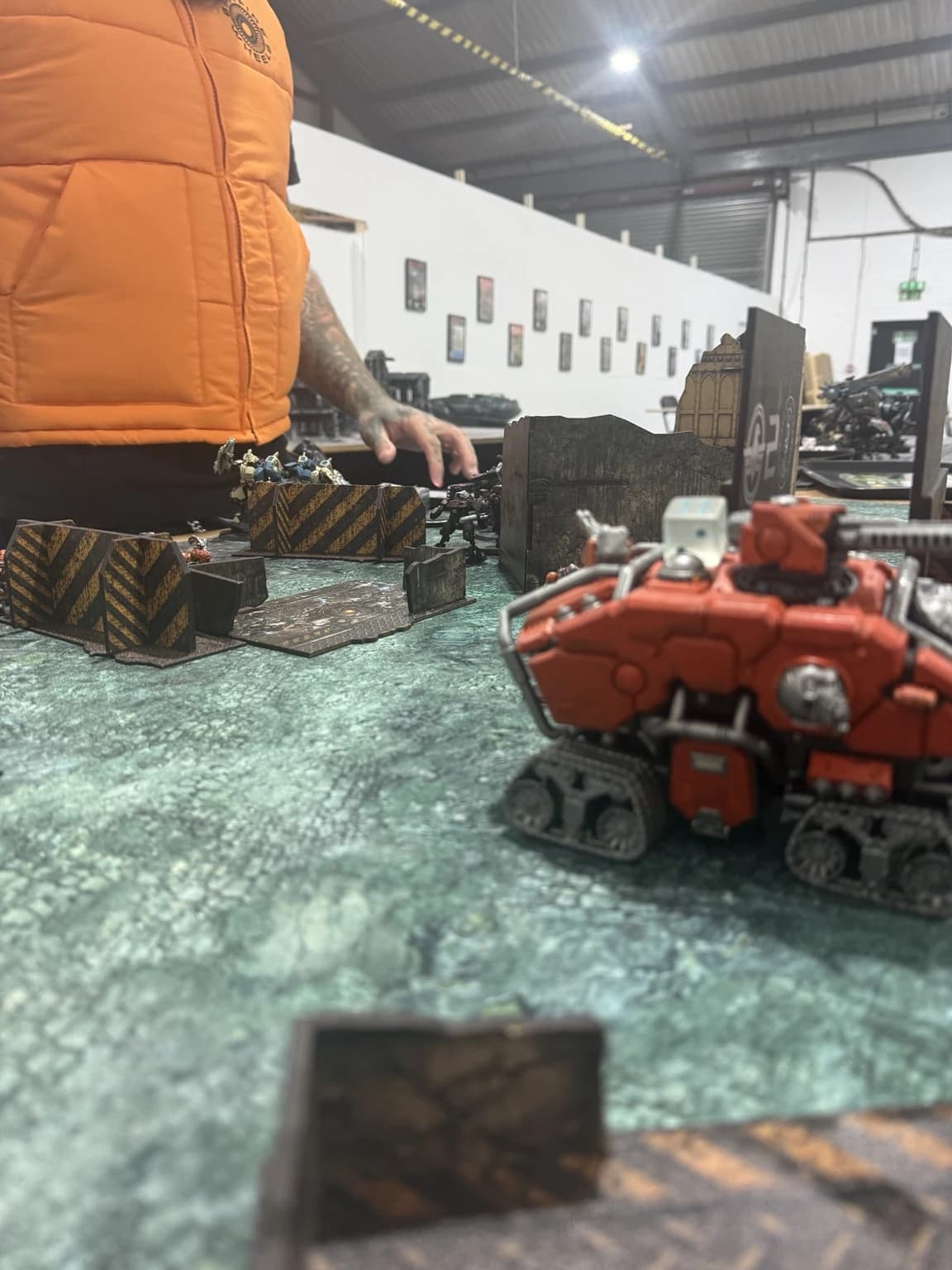 Close view past the orange Hekaton towards the central ruins and remaining models